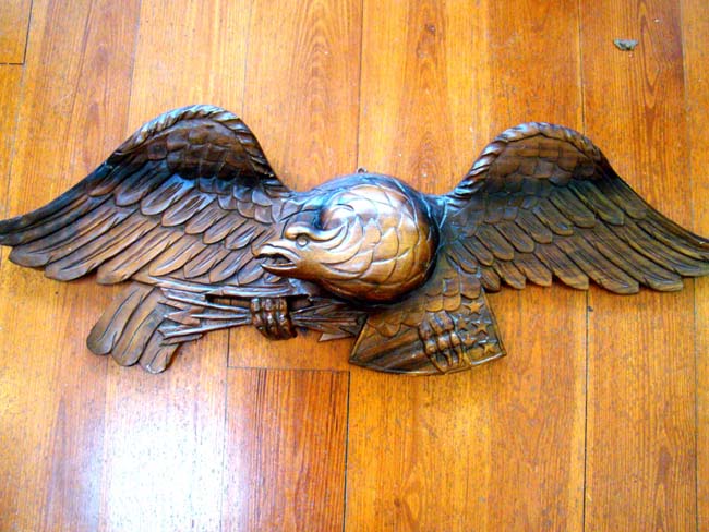 A large vintage carved mahogany American eagle plaque